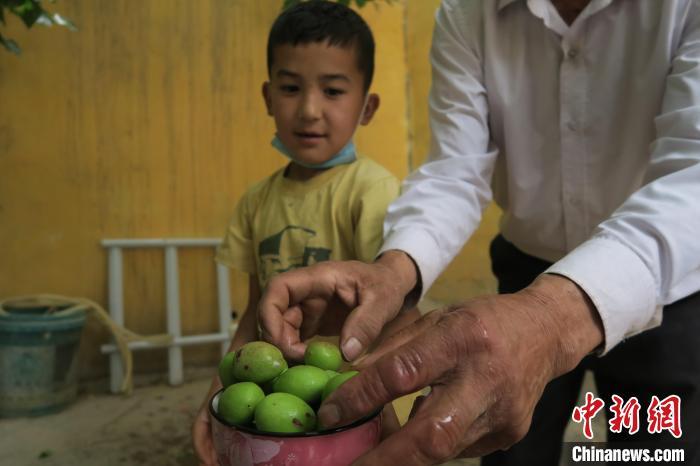 圖為進(jìn)藏先遣英雄連誓師地原址所在的新疆維吾爾自治區(qū)和田地區(qū)于田縣普魯村現(xiàn)貌?！畛坛?攝