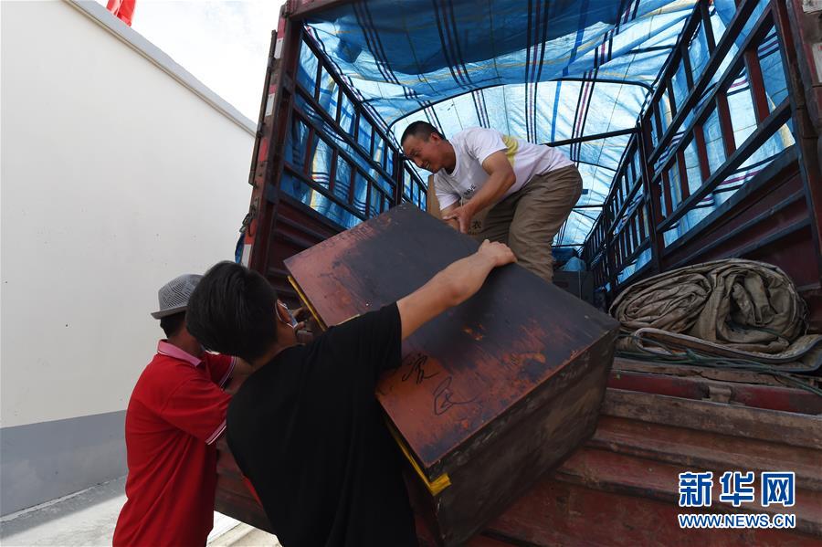 （新華全媒+）（26）千里“挪窩”，踏實(shí)開啟新生活