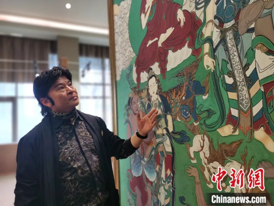 國家一級美術(shù)師劉觖。張?zhí)砀?攝