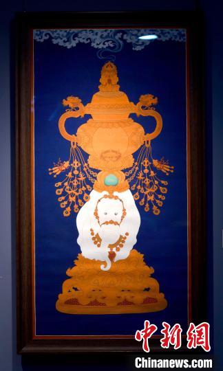 圖為5月16日，展覽中的新創(chuàng)唐卡作品《瑞象承香》?！±盍?攝